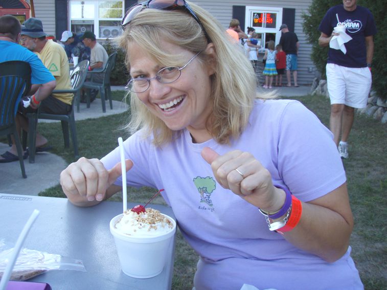 Theresa eating some ice cream and smiling