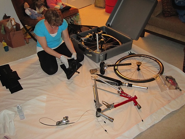Angela with her bike in pieces